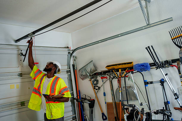 Professional Garage Door Panel Replacement technician working in Toledo, OR